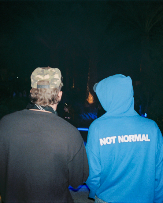 Otis wearing 'NOT NORMAL' HOODIE Back